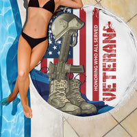 Round beach blanket with fringe edge, white with HONORING WHO ALL SERVED text, soldier rifle US flag artwork