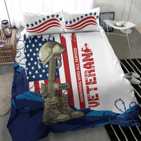 White bedding set with stars-and-stripes, rifle and boots, plus red HONORING WHO ALL SERVED text