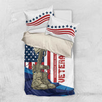 White bedding set with stars-and-stripes, rifle and boots, and red HONORING WHO ALL SERVED graphic