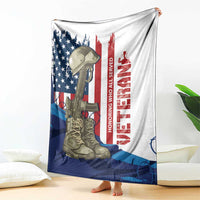 Patriotic Veterans Day blanket draped over bed, U.S. flag and soldier boots graphic