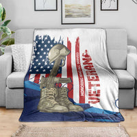 Patriotic Veterans Day blanket over gray sofa back, U.S. flag and soldier boots graphic