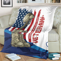 Patriotic Veterans Day blanket on couch, U.S. flag, soldier boots, and red vertical text