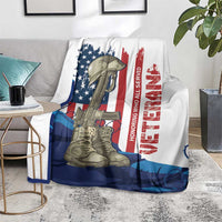 Patriotic Veterans Day blanket on living room floor, U.S. flag and soldier boots graphic