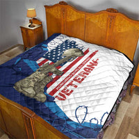 Veterans Day quilt on a bed with soldier and US flag design, white center and blue bottom