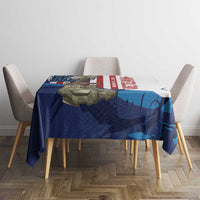 White tablecloth with blue and red patriotic service graphic on dining table