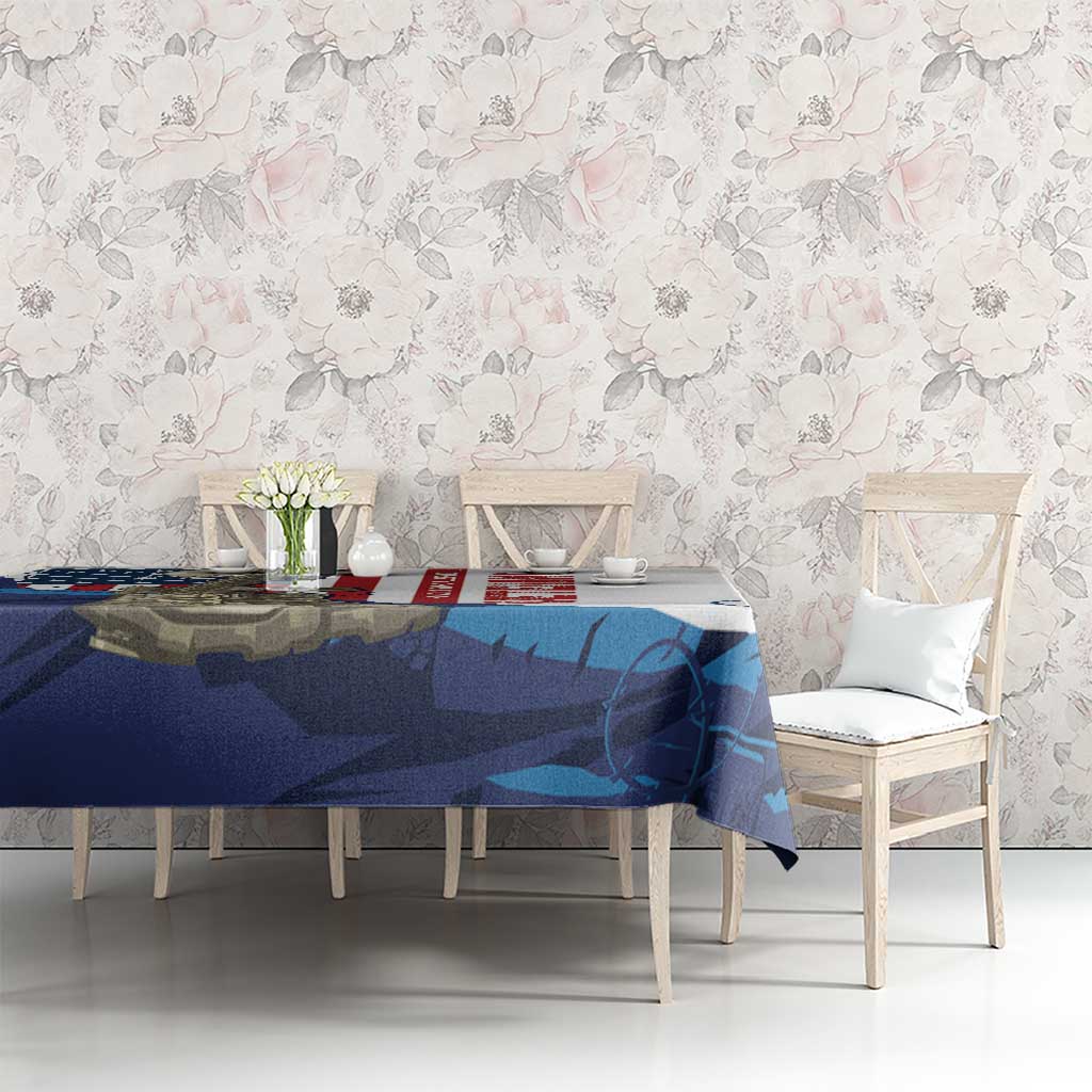 White tablecloth with blue, red, and camouflage military graphic on dining table