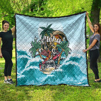 Light blue quilt with tropical skeleton and “Aloha” print, ocean-wave bottom