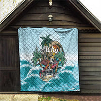 Blue quilt hung outdoors with diamond pattern and “Aloha” tropical skeleton artwork