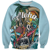 Blue crewneck sweatshirt with tropical skeleton graphic and aloha-style text, front view