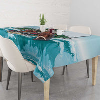 Blue tropical tablecloth with ocean splashes and colorful skeleton graphic