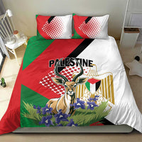 Bedding set with red, green, white gazelle emblem and two pillows, neatly styled on bed