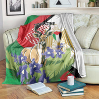 Palestine blanket with gazelle and purple flowers, red green black white graphic design