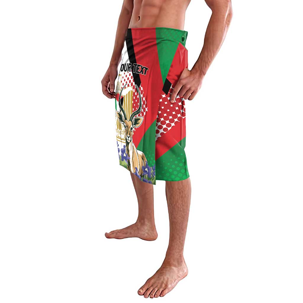 Personalized lavalava with red-green-black geometric print, gazelle illustration, custom text