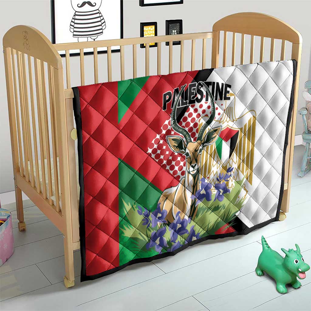 Palestine quilt blanket on light-wood crib with red, green, white panels and quilted pattern