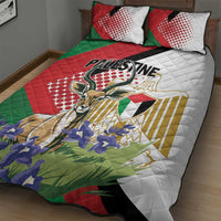 Quilt bed set featuring gazelle, blue flowers, and “PALESTINE” lettering on red green white quilt