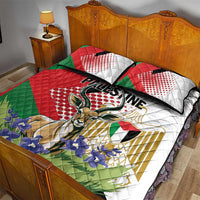 Quilt bed set with gazelle emblem, red green white quilt and two matching pillowcases