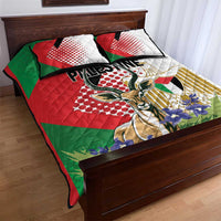 Quilt bed set with gazelle artwork and blue flowers, red green white quilt with two pillows