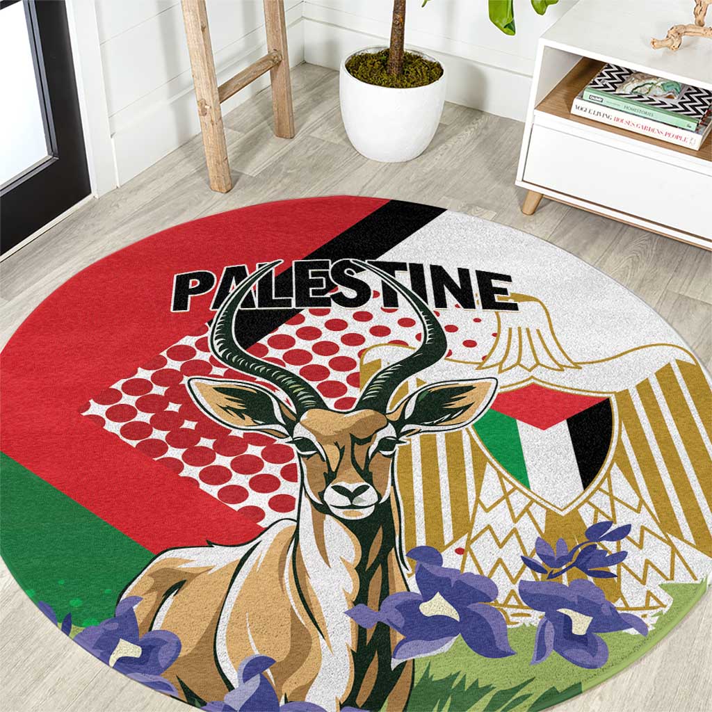 Round area rug with gazelle and Palestine lettering, red green black and blue graphic