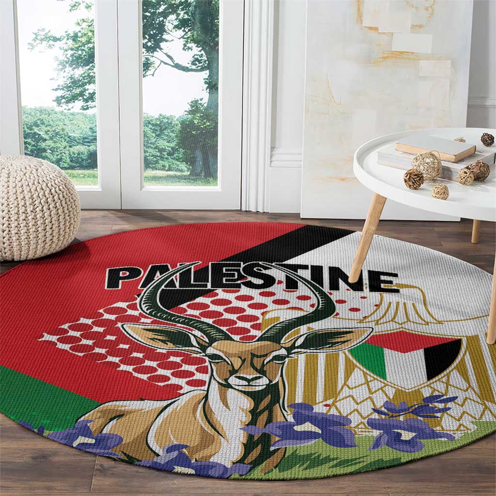 Round area rug with gazelle portrait and Palestine lettering, red green black white and gold