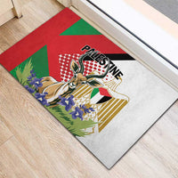 Rubber doormat corner view, Palestine Gazelle artwork with blue flowers on gray base