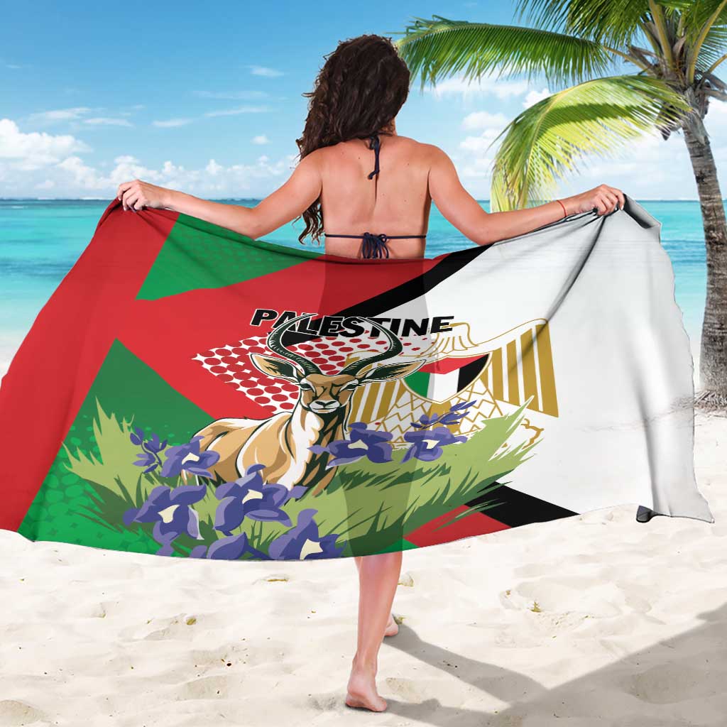 Printed sarong draped over back, white with red green black Gazelle and PALESTINE
