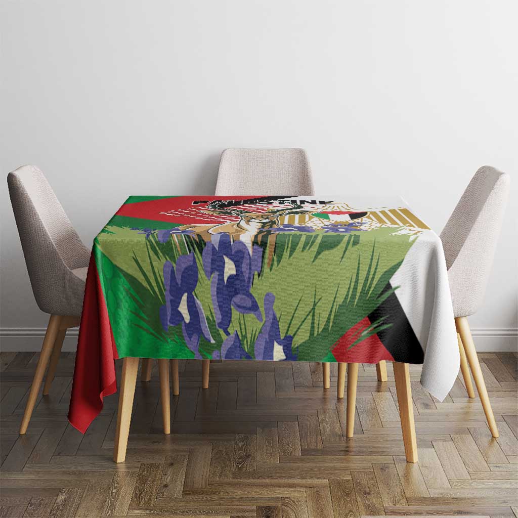 Square tablecloth with bold gazelle and floral Palestine graphic on dining table.