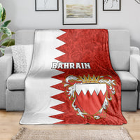Draped Bahrain-themed red and white blanket with coat-of-arms crest and BAHRAIN text