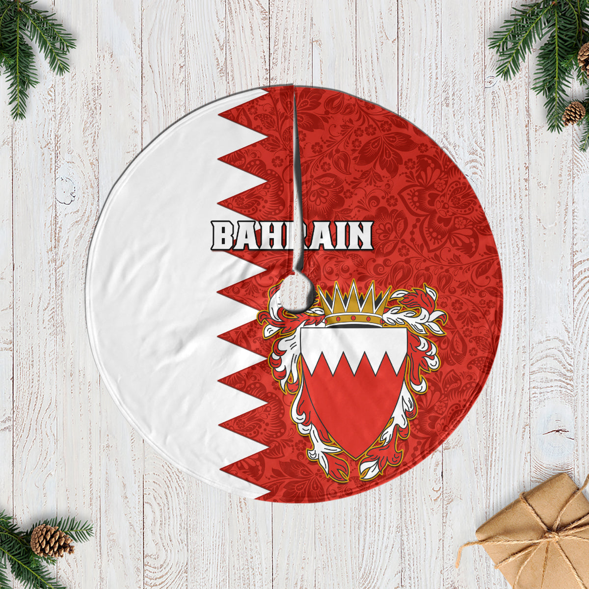 Red circular tree skirt with Bahrain coat of arms on white rays, floral pattern