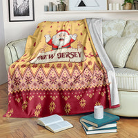 Yellow Santa-themed Christmas blanket with 'New Jersey' emblem and red geometric border