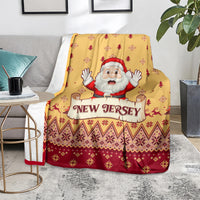 Yellow Christmas blanket with Santa and 'New Jersey' text, red tree and snowflake pattern