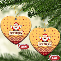 Yellow heart-shaped ceramic Christmas ornaments with Santa and "NEW JERSEY" text, hanging
