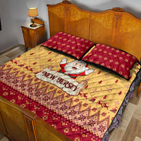 Santa Claus Christmas quilt set with beige quilt, red pillows, Santa New Jersey center