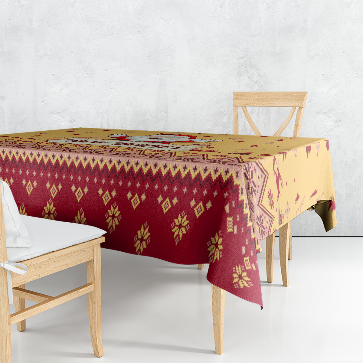 Christmas tablecloth draped on dining table, gold and red geometric holiday pattern