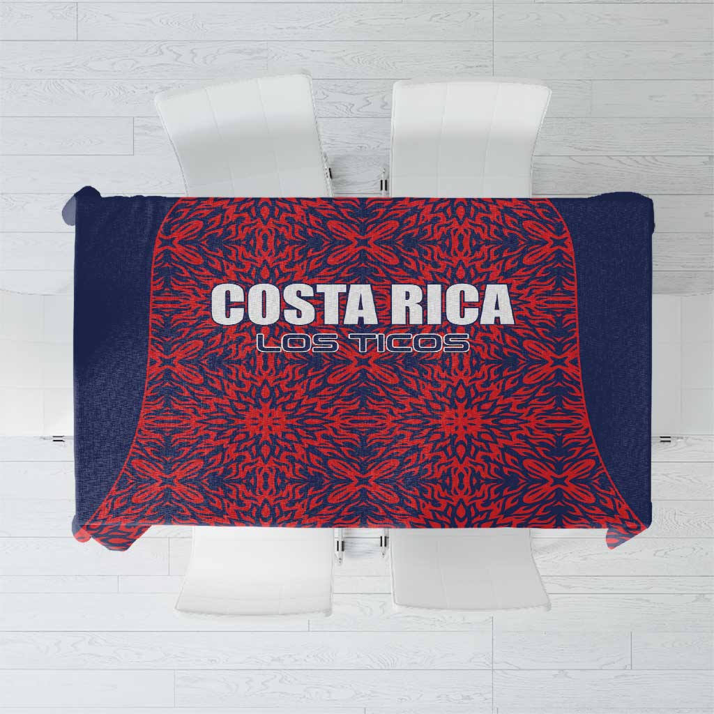 Navy-bordered red tablecloth with 'COSTA RICA' and 'LOS TICOS' text