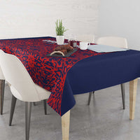 Red and navy football tablecloth draped over a dining table