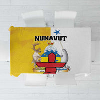 Yellow and white tablecloth set with colorful Arctic graphic and patterned border.