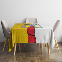 Two-tone yellow and gray tablecloth with large red-and-black figure graphic centerpiece.