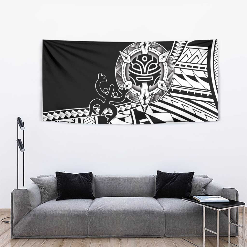 Black Polynesian tattoo tapestry with white tiki face, curving lines, and zigzag bands