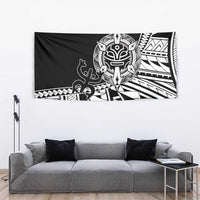 Black Polynesian tattoo tapestry with white tiki face, curving lines, and zigzag bands