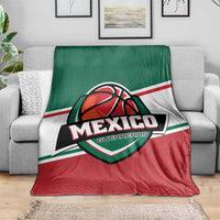 Mexico basketball blanket folded on sofa with Mexico Guerreros emblem in center