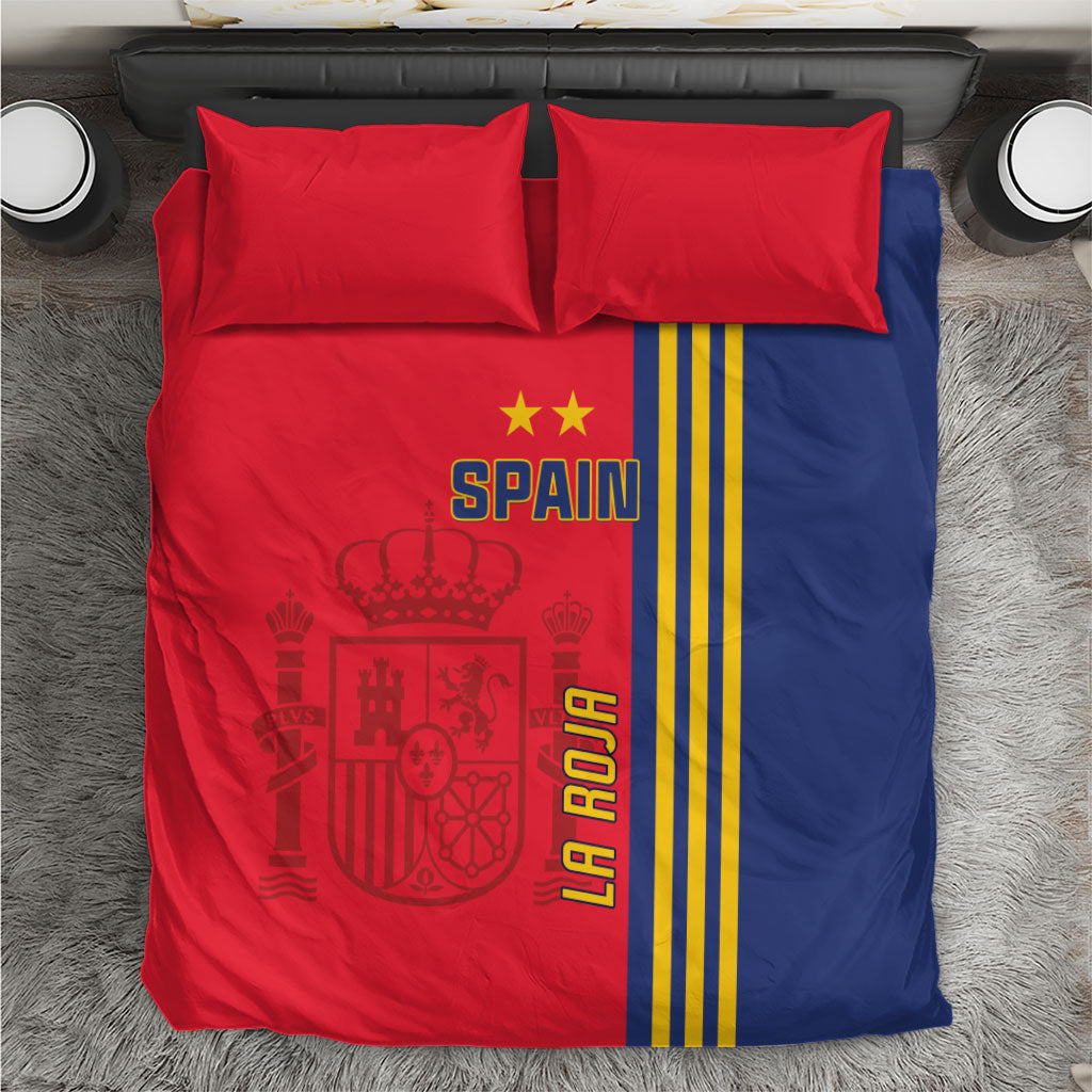 Spain bedding set: red/blue comforter with Spain crest, yellow stripes, plus 2 red pillowcases.