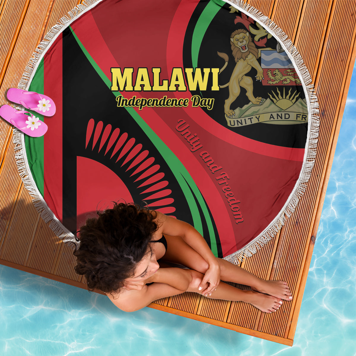 Round beach blanket with Malawi Independence Day emblem, red/green/black colors and white fringe