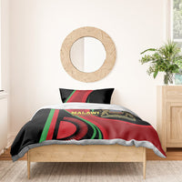 Malawi bedding set on wooden bed frame with duvet and one pillow, flag graphics and text.