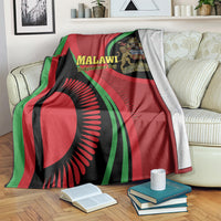 Malawi Independence Day throw blanket in red, green, and black with circular emblem