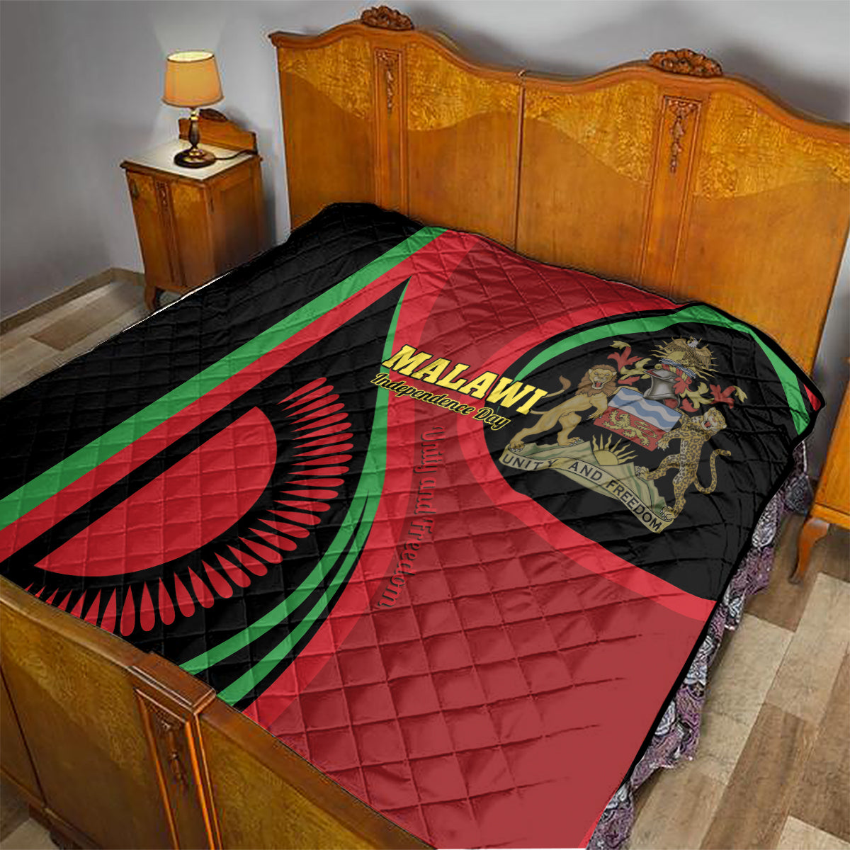 Red and black quilt with green stripe accents and Malawi emblem on a wooden bed
