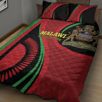 Quilt bed set with red, black, and green Malawi Independence Day graphic and two pillows