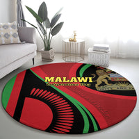 Round red, black, and green carpet featuring Malawi Independence Day emblem
