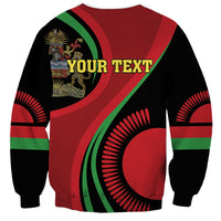 Unisex black sweatshirt with large circular “Your Text” patch and red-green pattern sleeves