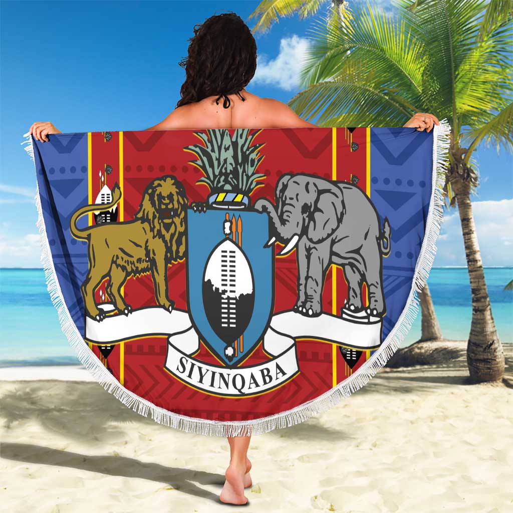Round beach blanket in red, blue and white with animal shield print and fringed border