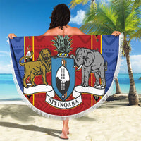 Round beach blanket in red, blue and white with animal shield print and fringed border
